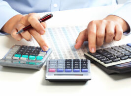 Hand With Calculator. Finance And Accounting Business.